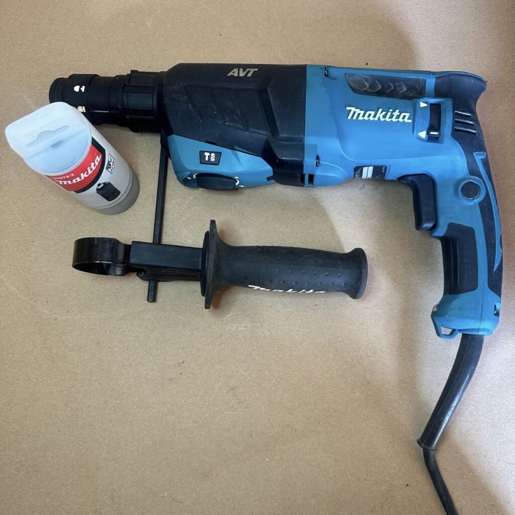 Makita HR2631FT borehammer med borepatron og håndtag inkl. kuffert